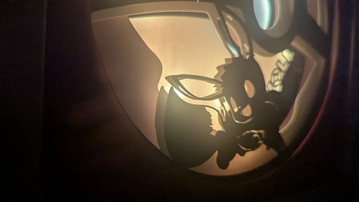 Lightbox Pokémon Évoli en papercut, ambiance lumineuse chaleureuse