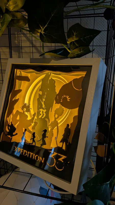 Cadre 3D multicouches en papier avec éclairage LED chaud pour décoration de salon ou bureau de gamer.