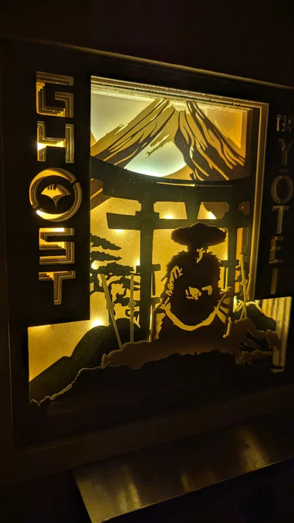 Lightbox Ghost of Yotei allumée, décoration murale en papier avec relief 3D et ambiance japonaise