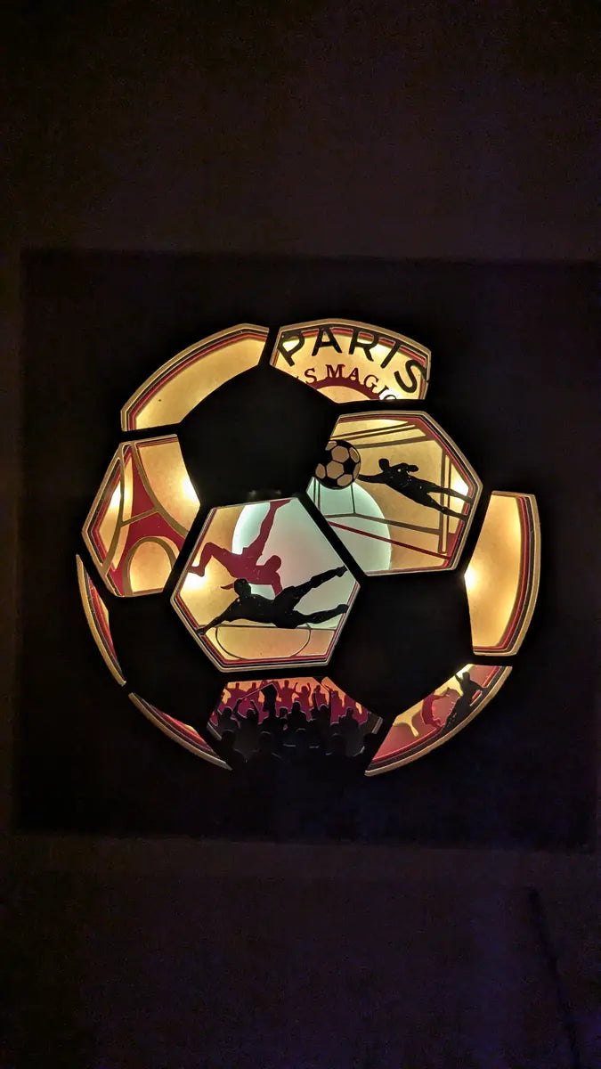 lightbox football en papier illuminée avec joueurs en action rouge et bleu