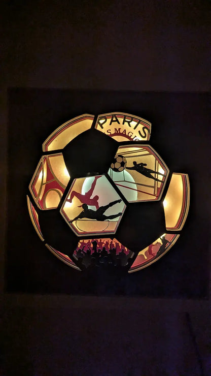 lightbox football en papier illuminée avec joueurs en action rouge et bleu