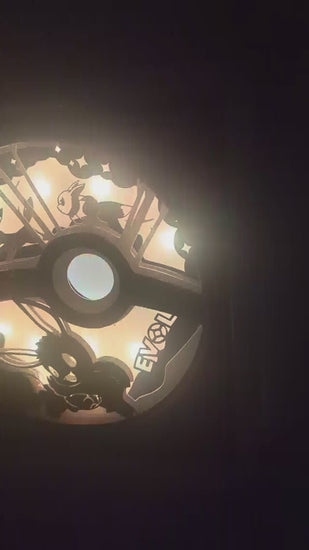 Présentation du cadre lightbox Évoli en papier multicouche, style papercraft