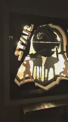 Vidéo mettant en valeur l’effet lumineux de la lightbox Star Wars, jeu d’ombres et de profondeur sur les différentes couches papier