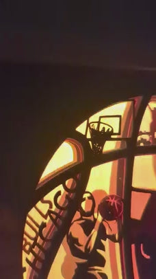 Détail d’un joueur NBA en dunk sur lightbox Chicago Bulls en papercut