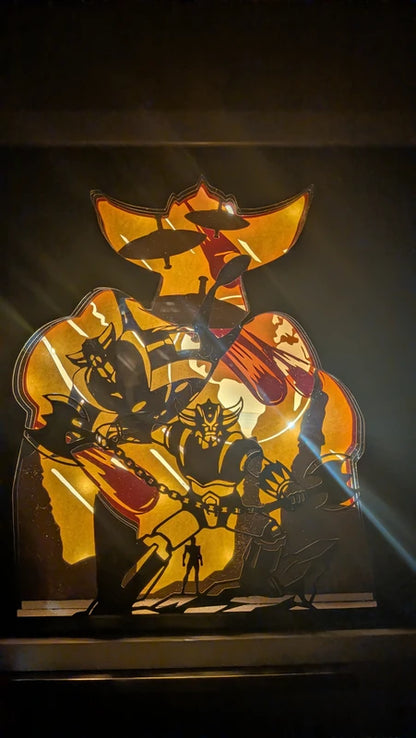 Veilleuse artisanale Goldorak mettant en avant l'astérohache, sculpture lumineuse 3D.